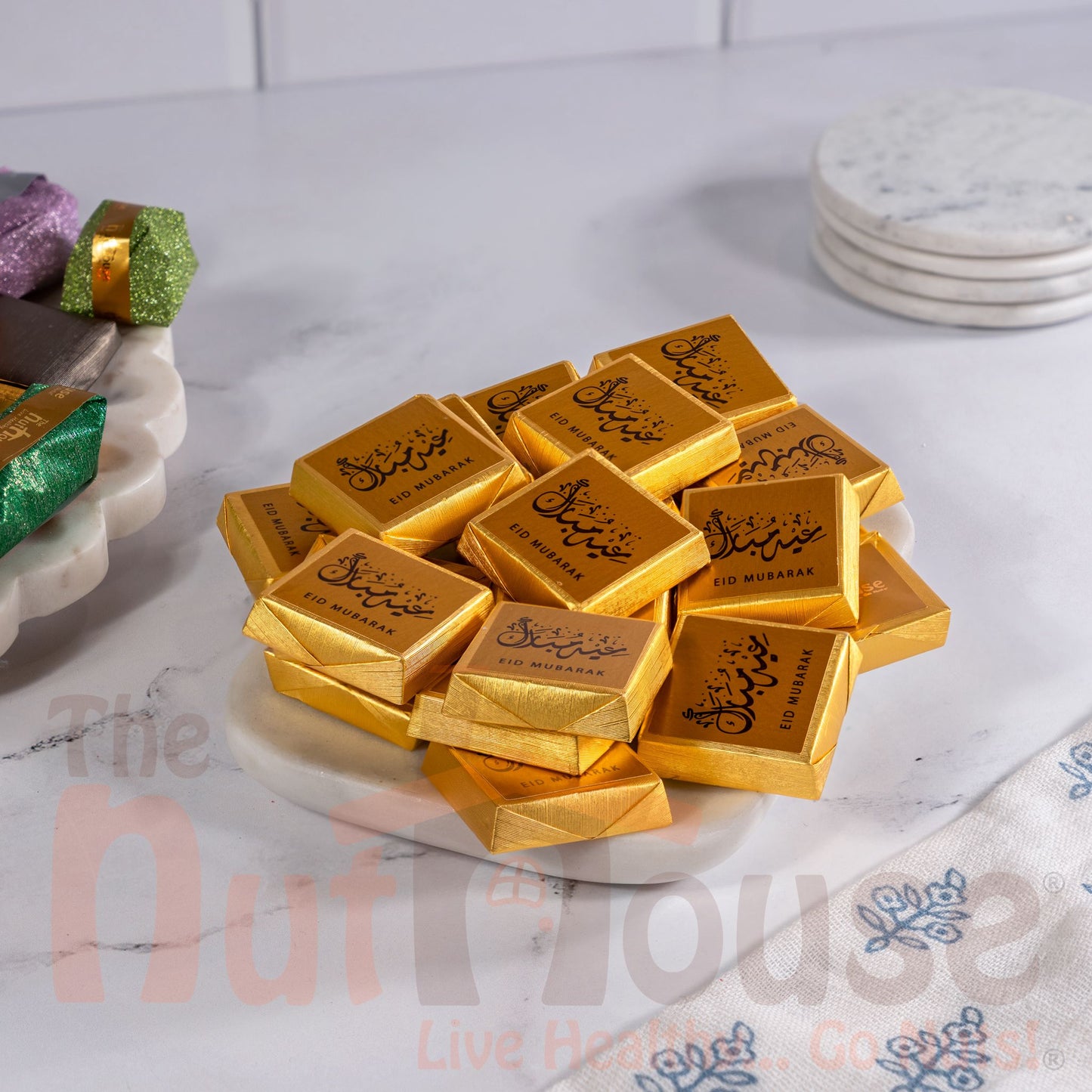 Gold Eid Mubarak chocolate covered crushed nuts with hazelnut cream