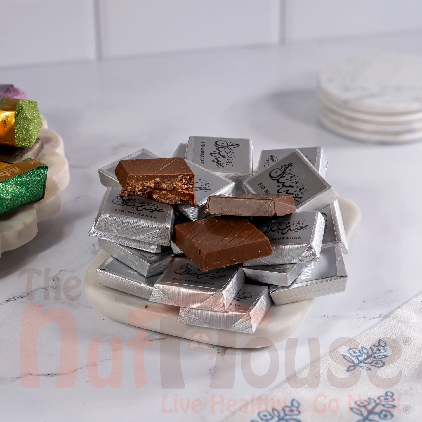 Silver Eid Mubarak chocolate covered crushed nuts with hazelnut cream